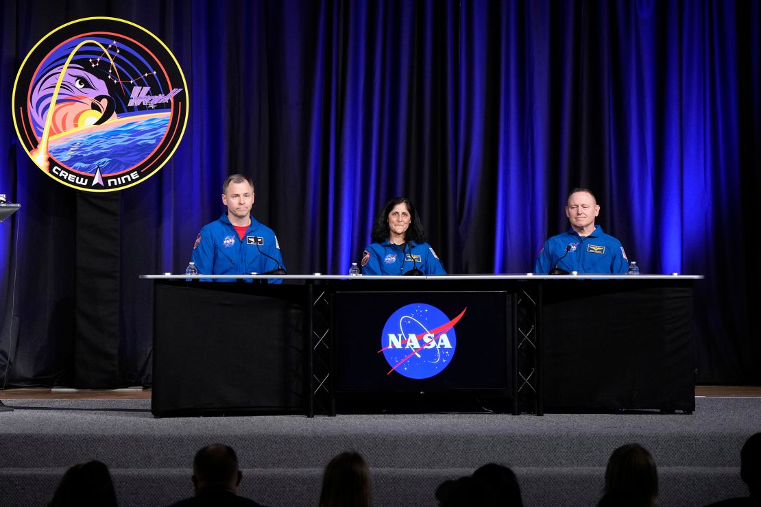 Astronauts Nick Hague, Suni Williams, and Butch Wilmore talk to reporters during a news conference at Johnson Space Center on March 31 in Houston.